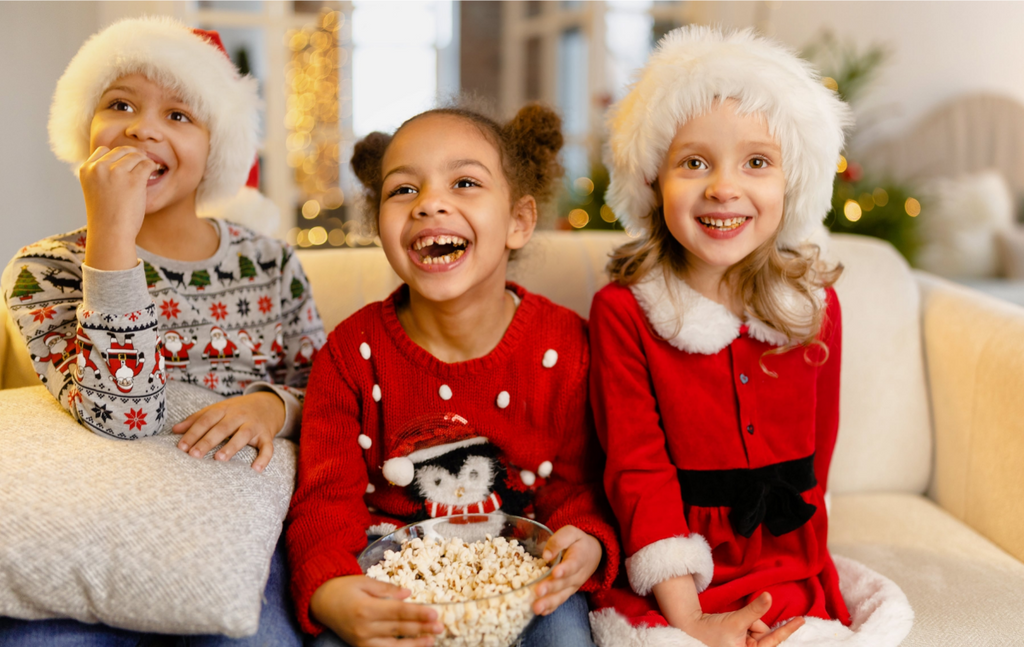 family enjoying festive Christmas films